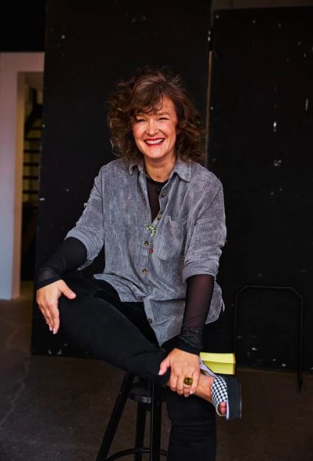 Paulina Kotowska, seated and laughing